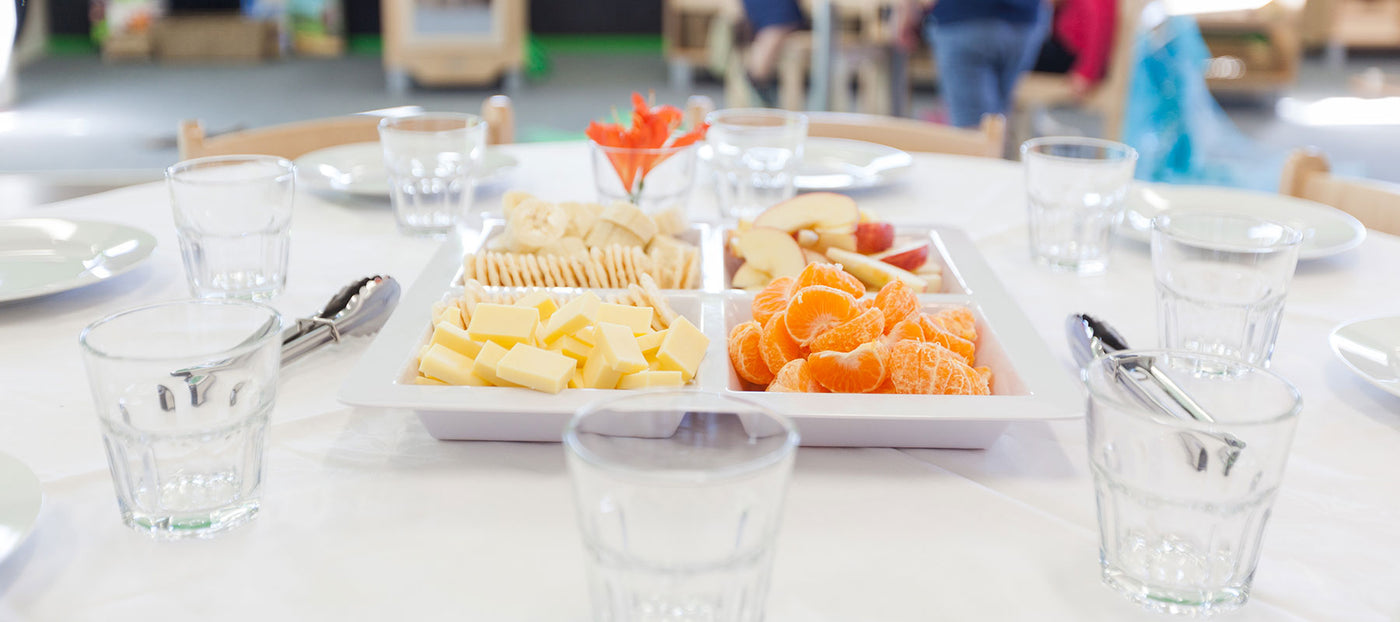 Morning tea and glasses at A pot full of colourful felt tip pens at Tadpoles Early Childhood Centre
