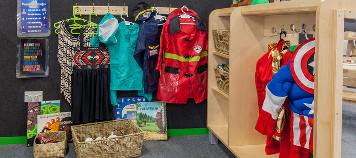 Costumes and dress ups at A pot full of colourful felt tip pens at Tadpoles Early Childhood Centre